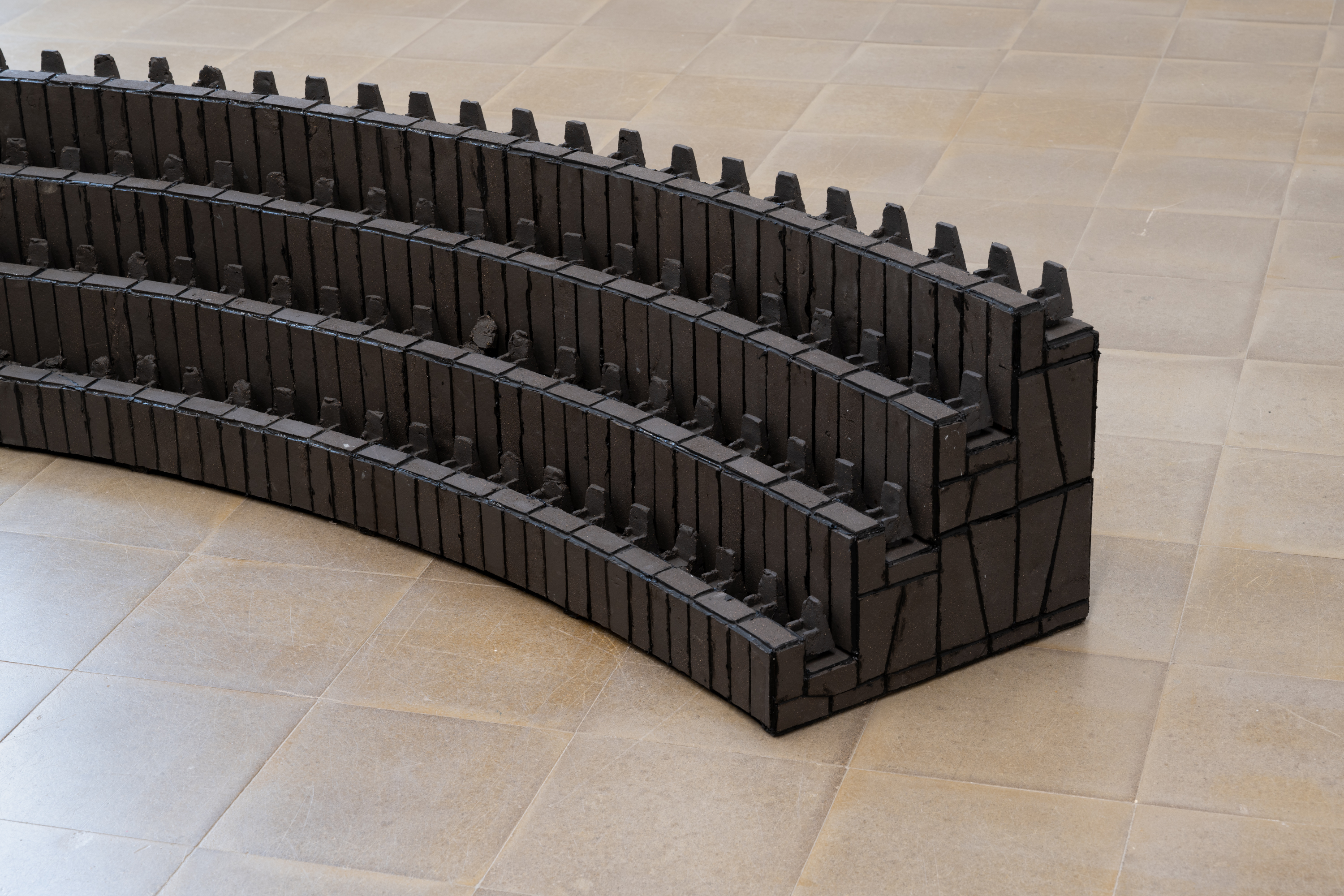 Daniel Drabek, *Parliament* (Detail), 2025. Ceramic, chamotte, silicone, wood, mdf, 36 × 270 × 73 cm. Photo: Finn Curry.